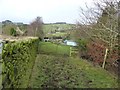 Footpath through Chatterton Lane Farm in SK6 5NF