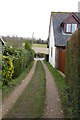 Footpath uses drive to reach Finchdean Road in PO9 6BX