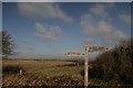 Signpost on south-west coastal path near Osmington in DT3 6LQ