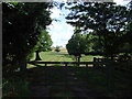 Gated farm track off Theddingworth Road (A304) in LE17 6LZ