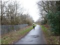 Cyclist heading west, National Cycle Route 1 in EH15 3QD