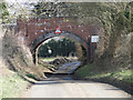 Close view of Brick Kiln Lane railway bridge in NR15 1QB