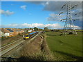 Train, railway and transmission towers, Portskewett in NP26 5SR