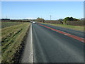 A614 towards Driffield  in YO25 4LF