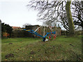 Old plough at Kenningham Hall in NR14 8AG