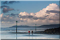 Figures on a windswept beach: Borth in SY24 5JF