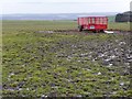 Portequip trailer in a muddy field, west of Rigg Farm in HG3 1FB