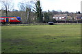Looking across railway line from footpath to Egham in TW20 9NW