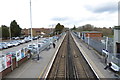 Looking up the line from the footbridge on Egham station in TW20 9LT