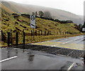 Grid across the A4107 on the approach to Abergwynfi in SA13 3YL
