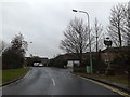 Collingham Road & Pinewood Village sign in IP8 3TR
