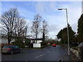 Road passing St Oswald, Burneside in Burneside