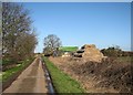 Bales and barn on West Fen Road in Over & Willingham Ward