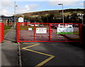 Red entrance gates to Garth Primary School, Maesteg in CF34 0RJ
