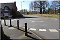Mini-roundabout on Baird Road in RG2 9TX
