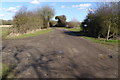Farm lane crossed by public footpath in RG2 9HT