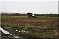 Beet harvester on a wet field near West Barkwith in West Torrington