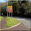 Reduce speed now sign at the edge of Littledean in GL14 3NN