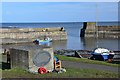 Craster Harbour and war memorial in NE66 3TP