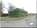 Ivy covered building at Wood Farm in IP13 7LR