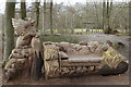 Carved seat in the woods at Polesden Lacey in KT23 4QD