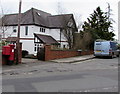 Pillarbox on the corner of Heol Isaf and Woodfield Avenue, Radyr, Cardiff in CF15 8DX