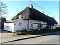Seventeenth century thatched cottages, Chalgrove High Street in OX44 7SD