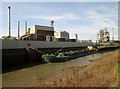 Tanker barge moored at riverside factory River Hull in HU5 1SW