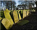 Gravestones, Beeford churchyard in YO25 8AZ