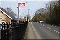Looking past the railway station on Howard Road in KT24 5HN