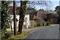 Houses on bend on Little Cranmore Lane in KT24 6HS