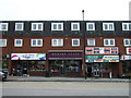 Shops on Huddersfield Road, Oldham in OL4 2HT