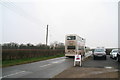 Bus passing Anderby Village Hall in Anderby