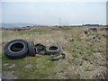 Tyres on open access moorland, off Snowden Carr Road in LS21 2NE