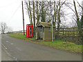Bus shelter and telephone kiosk at Carlton Hill in CB8 9LF