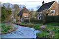 Cottages beside the River Ebble at Stratford Tony in SP5 4AX