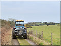 Tractor on path between Stonebarrow Hill and Greenlands Farm in DT6 6EW