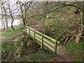 Footbridge crossing Straw Dean in TD15 2LQ