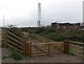 Wooden gate to a track alongside the A4810, Llanwern in NP19 4RG