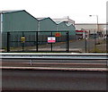 Locked gates at an entrance to Llanwern Steelworks in NP19 4QX