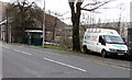 White van and dark green bus shelter in Llwynypia in CF41 7SJ
