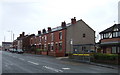 Terraced housing on Manchester Road (A6) in BL5 3ZL