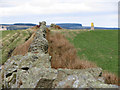 Drystone wall and trig point above Ynyshir in CF39 9UE