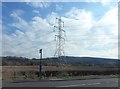 Pylon in field beside Beith Road in PA10 2NS