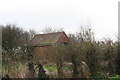 Shed in a field corner by Brigg Road, North Kelsey in LN7 6EZ