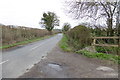 Road goes east to Kingsclere from footpath junction in RG20 5QD