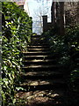West Milton: steps to the churchyard in DT6 3SL