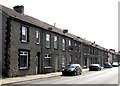 Long row of houses and satellite dishes, Ynysybwl in CF37 3HJ