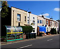 Lower Ford Street houses, wheelie bins and bus shelter, Coventry in CV1 5PQ