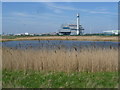 Belvedere Incinerator seen across a lake on Erith Marshes in DA17 6BG